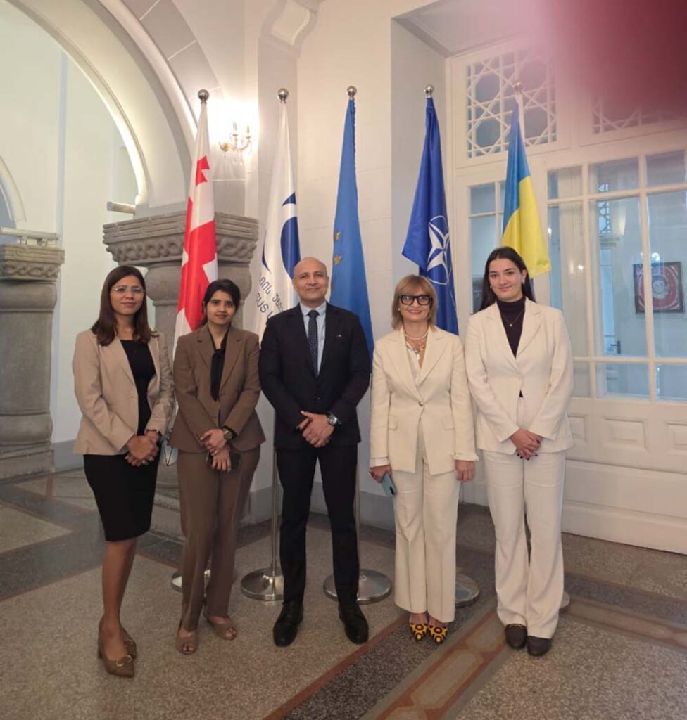 International education leaders with students at global immersion program